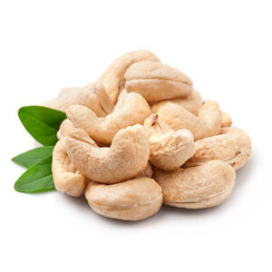 Cashew nuts heap with leaves on white backgrounds. healthy food ingredient