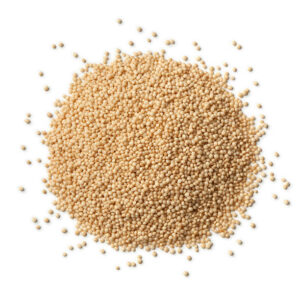 Heap of raw amaranth seeds on white background