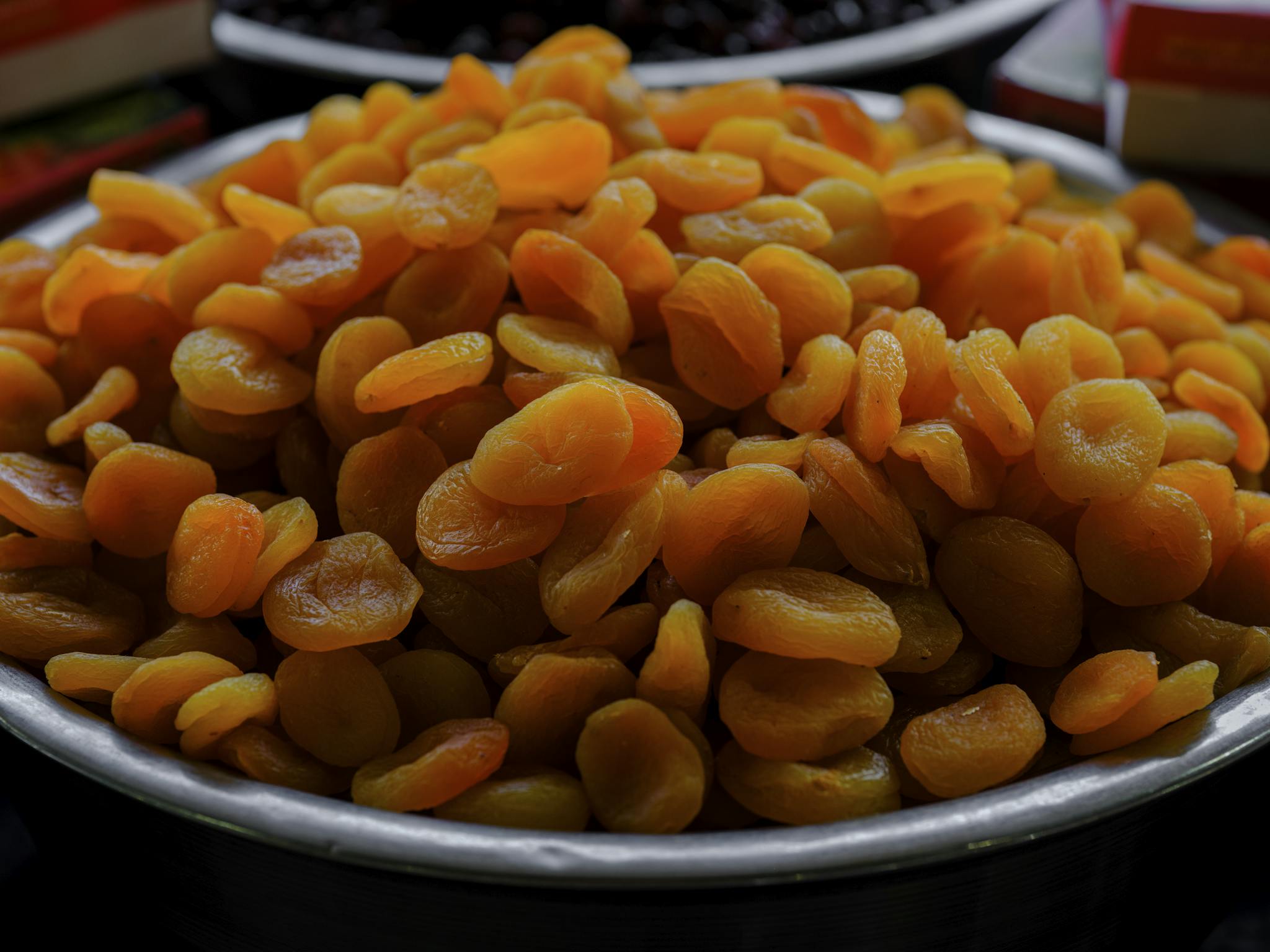 A vibrant display of dried apricots, perfect for a healthy snack or gourmet cooking.